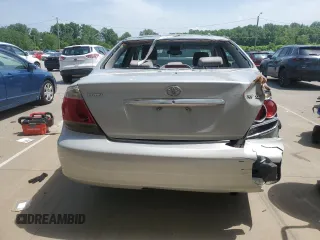 2005 Toyota Camry STD с VIN 4T1BE32K45U041477, выставлен на аукционе Copart как лот 57129635 с пробегом 216 497 миль миль и Списание • Salvage title. История ставок и продаж доступна на DreamBid. Изображение 6.