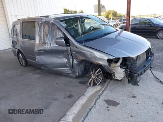 2014 Dodge Grand Caravan SXT with VIN 2C4RDGCG3ER193688, listed as a IAAI auction lot 41290544 with 73,092 mi miles and . Bid and sale history available at DreamBid. Image 1.