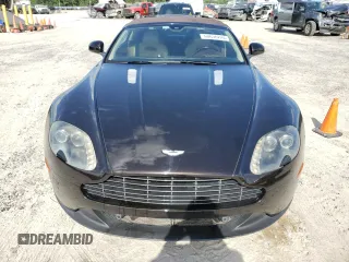 2013 Aston Martin Vantage z VIN SCFEKBBK1DGD17118, wystawiony jako Copart lot #60636224 z przebiegiem 50 591 mil mil oraz Szkody całkowita. Historia ofert i sprzedaży dostępna na DreamBid. Obrazek 5.