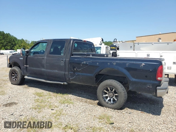 2000 Ford F-350 XL with VIN 1FTSW31F3YEB20854, listed as a Copart auction lot 61717865 with 209,288 mi miles and Salvage title. Bid and sale history available at DreamBid. Image 2.