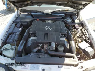 1992 Mercedes-Benz 500 z VIN WDBFA66E7NF049079, wystawiony jako Copart lot #52642285 z przebiegiem 69 976 mil mil oraz Szkody całkowita. Historia ofert i sprzedaży dostępna na DreamBid. Obrazek 11.