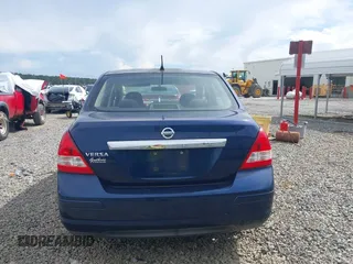 2011 Nissan Versa S with VIN 3N1BC1AP2BL408977, listed as a IAAI auction lot 42524102 with 195,285 mi miles and . Bid and sale history available at DreamBid. Image 16.