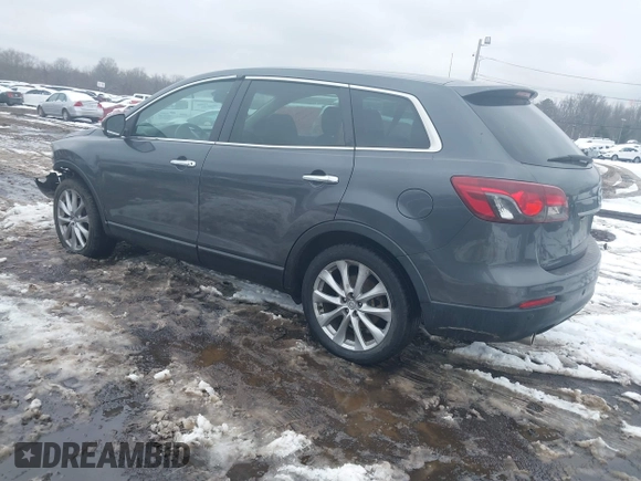 2014 Mazda CX-9 Grand Touring with VIN JM3TB3DV9E0440506, listed as a IAAI auction lot 41537718 with 217,299 mi miles and . Bid and sale history available at DreamBid. Image 3.