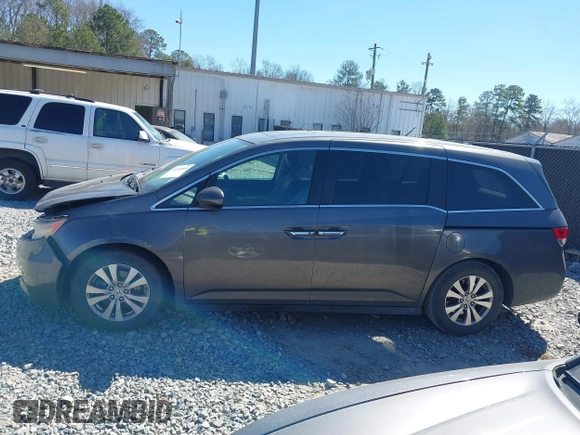 2014 Honda Odyssey EX-L with VIN 5FNRL5H61EB014695, listed as a IAAI auction lot 41694860 with 261,265 mi miles and . Bid and sale history available at DreamBid. Image 14.