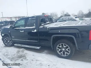 2014 GMC Sierra 1500 SLT with VIN 1GTV2VECXEZ100108, listed as a IAAI auction lot 41589773 with 203,471 mi miles. Bid and sale history available at carsss.com. Image 14.