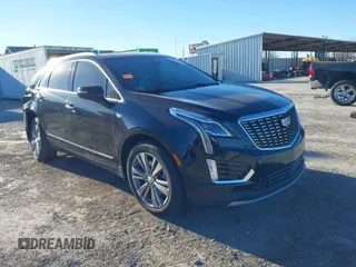 2024 Cadillac XT5 FWD Premium Luxury with VIN 1GYKNCRS4RZ729461, listed as a IAAI auction lot 41411300 with 5,760 mi miles. Bid and sale history available at carsss.com. Image 1.