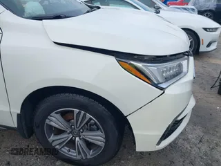 2019 Acura MDX z VIN 5J8YD3H37KL005867, wystawiony jako IAAI lot #40480570 z przebiegiem 89 867 mil mil oraz . Historia ofert i sprzedaży dostępna na DreamBid. Obrazek 19.