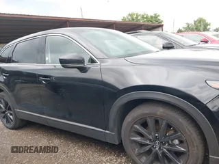 2023 Mazda CX-9 Touring Plus with VIN JM3TCBAY2P0657825, listed as a IAAI auction lot 42756562 with 52,090 mi miles and . Bid and sale history available at DreamBid. Image 13.