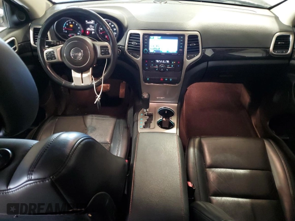 2011 Jeep Grand Cherokee Laredo with VIN 1J4RS4GG9BC517059, listed as a Copart auction lot 52704705 with 120,171 mi miles and Salvage Title. Bid and sale history available at DreamBid. Image 8.