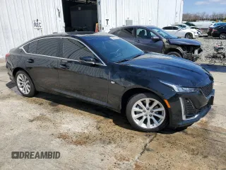 2024 Cadillac CT5 Luxury with VIN 1G6DX5RK0R0127765, listed as a Copart auction lot 50882525 with 8,060 mi miles and Salvage title. Bid and sale history available at DreamBid. Image 4.