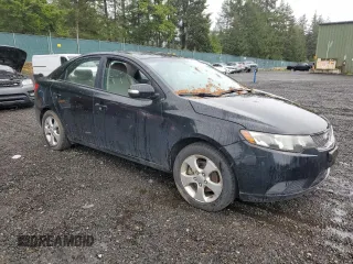 2010 Kia Forte EX z VIN KNAFU4A24A5251210, wystawiony jako Copart lot #57707605 z przebiegiem 165 166 mil mil oraz Czysty tytuł • Clean title. Historia ofert i sprzedaży dostępna na DreamBid. Obrazek 4.