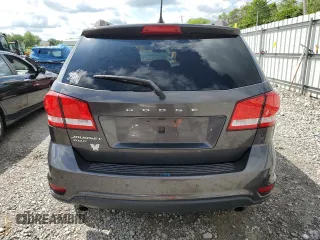 2017 Dodge Journey SXT z VIN 3C4PDDBG3HT703935, wystawiony jako Copart lot #57620915 z przebiegiem 126 915 mil mil oraz Szkoda całkowita • Salvage title. Historia ofert i sprzedaży dostępna na DreamBid. Obrazek 6.