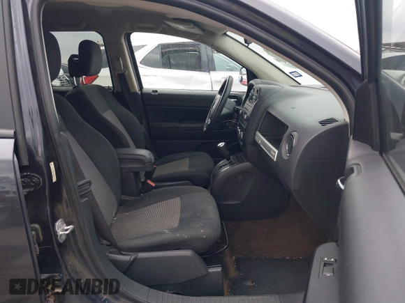 2014 Jeep Compass Sport with VIN 1C4NJCBB0ED647937, listed as a IAAI auction lot 41444062 with 135,679 mi miles and . Bid and sale history available at DreamBid. Image 5.