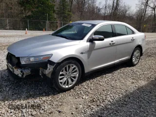 2014 Ford Taurus Limited with VIN 1FAHP2F83EG106227, listed as a Copart auction lot 63055365 with 194,026 mi miles and Salvage title. Bid and sale history available at DreamBid. Image 1.