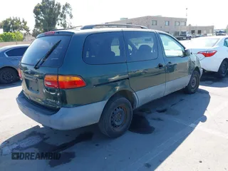2000 Toyota Sienna LE with VIN 4T3ZF13CXYU312352, listed as a IAAI auction lot 42629403 with 166,361 mi miles and . Bid and sale history available at DreamBid. Image 4.