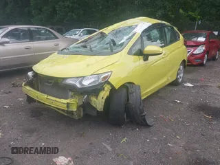 2015 Honda Fit LX z VIN 3HGGK5H5XFM734030, wystawiony jako IAAI lot #42596983 z przebiegiem 243 436 mil mil oraz . Historia ofert i sprzedaży dostępna na DreamBid. Obrazek 2.