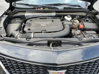 2023 Cadillac XT4 AWD Sport z VIN 1GYFZFR45PF128521, wystawiony jako Copart lot #53185325 z przebiegiem 17 657 mil mil oraz Szkoda całkowita • Salvage title. Historia ofert i sprzedaży dostępna na DreamBid. Obrazek 13.