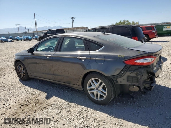 2016 Ford Fusion SE with VIN 3FA6P0H7XGR386496, listed as a Copart auction lot 61578165 with 101,467 mi miles and Salvage title. Bid and sale history available at DreamBid. Image 2.