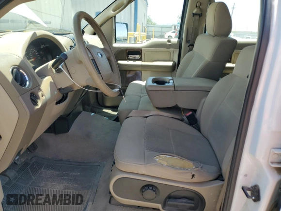2006 Ford F-150 XLT с VIN 1FTRW12W16KB23901, выставлен на аукционе Copart как лот 61093795 с пробегом 164 084 миль миль и Списание • Salvage title. История ставок и продаж доступна на DreamBid. Изображение 7.