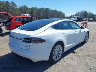 2017 Tesla Model S 100D with VIN 5YJSA1E23HF189813, listed as a IAAI auction lot 41767079 with 53,541 mi miles. Bid and sale history available at carsss.com. Image 4.