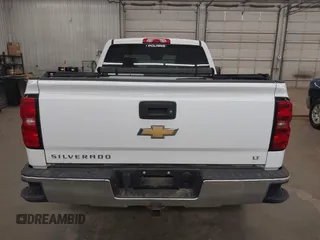 2016 Chevrolet Silverado 1500 LT with VIN 1GCVKRECXGZ185493, listed as a IAAI auction lot 42013856 with 255,462 mi miles and . Bid and sale history available at DreamBid. Image 17.