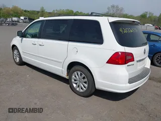 2012 Volkswagen Routan SE z VIN 2C4RVABG0CR193964, wystawiony jako IAAI lot #42122834 z przebiegiem 185 389 mil mil oraz . Historia ofert i sprzedaży dostępna na DreamBid. Obrazek 3.