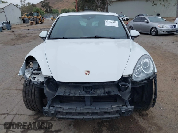 2014 Porsche Cayenne with VIN WP1AA2A27ELA09019, listed as a IAAI auction lot 42068012 with 77,997 mi miles and . Bid and sale history available at DreamBid. Image 13.