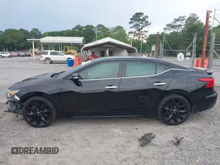 2018 Nissan Maxima Platinum z VIN 1N4AA6AP9JC392479, wystawiony jako IAAI lot #42209148 z przebiegiem 103 710 mil mil oraz . Historia ofert i sprzedaży dostępna na DreamBid. Obrazek 14.