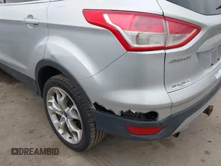 2013 Ford Escape Titanium с VIN 1FMCU9J91DUA13353, выставлен на аукционе IAAI как лот 42074045 с пробегом 108 452 миль миль и . История ставок и продаж доступна на DreamBid. Изображение 6.