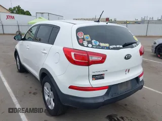 2013 Kia Sportage LX with VIN KNDPBCA21D7356092, listed as a IAAI auction lot 42111086 with 102,521 mi miles and . Bid and sale history available at carsss.com. Image 3.