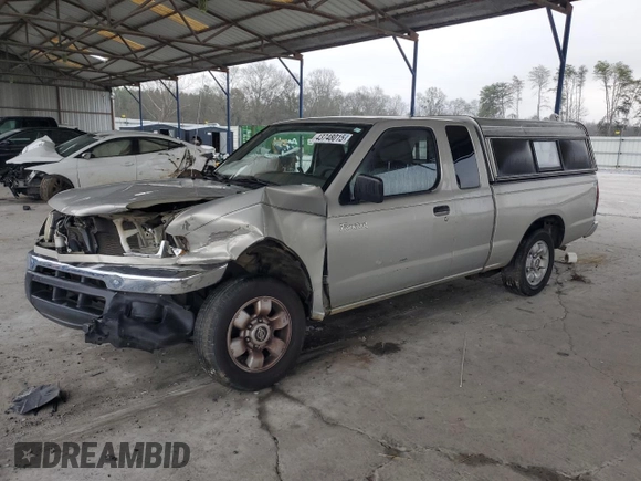 1999 Nissan Frontier XE with VIN 1N6DD26SXXC344449, listed as a Copart auction lot 43748015 with 137,318 mi miles and Salvage title. Bid and sale history available at DreamBid. Image 1.
