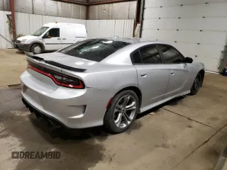 2021 Dodge Charger R/T with VIN 2C3CDXCT5MH522015, listed as a Copart auction lot 61149265 with 77,323 mi miles and Salvage title. Bid and sale history available at DreamBid. Image 3.