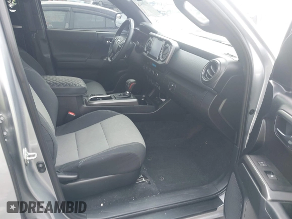 2021 Toyota Tacoma SR z VIN 3TMCZ5AN0MM386867, wystawiony jako IAAI lot #41580426 z przebiegiem 46 559 mil mil oraz . Historia ofert i sprzedaży dostępna na DreamBid. Obrazek 5.