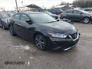 2019 Nissan Maxima Platinum z VIN 1N4AA6AV3KC366377, wystawiony jako IAAI lot #41295236 z przebiegiem 42 987 mil mil oraz . Historia ofert i sprzedaży dostępna na DreamBid. Obrazek 1.