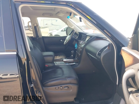 2014 Infiniti QX80 with VIN JN8AZ2NF2E9555610, listed as a IAAI auction lot 42765210 with 215,717 mi miles and . Bid and sale history available at DreamBid. Image 5.