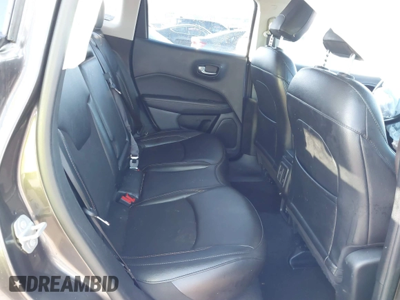 2020 Jeep Compass Latitude with VIN 3C4NJDBB3LT223939, listed as a IAAI auction lot 41832921 with 83,938 mi miles and . Bid and sale history available at DreamBid. Image 8.
