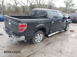 2011 Ford F-150 XLT with VIN 1FTFW1CT5BFB13799, listed as a IAAI auction lot 41426609 with 200,000 mi miles. Bid and sale history available at carsss.com. Image 4.