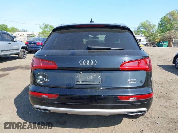 2018 Audi Q5 Premium with VIN WA1ANAFY4J2003668, listed as a IAAI auction lot 42167687 with 140,548 mi miles and . Bid and sale history available at DreamBid. Image 16.