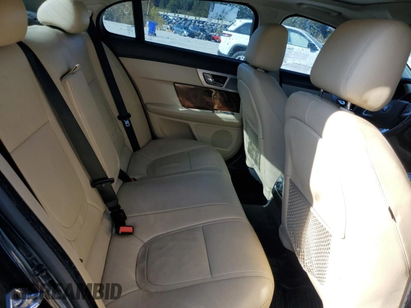 2014 Jaguar XF SC with VIN SAJWA0EX3E8U29494, listed as a Copart auction lot 76844324 with 103,776 mi miles and Clean Title. Bid and sale history available at DreamBid. Image 10.