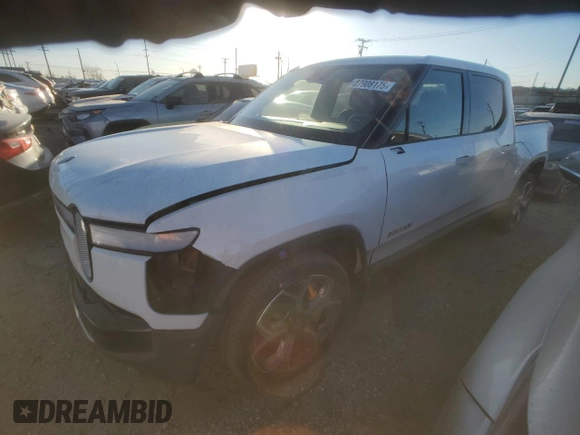 2022 Rivian R1T Adventure z VIN 7FCTGAAA9NN014280, wystawiony jako Copart lot #87908175 z przebiegiem 28 601 mil mil oraz Szkody całkowita. Historia ofert i sprzedaży dostępna na DreamBid. Obrazek 1.