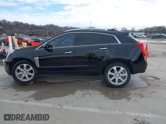 2013 Cadillac SRX Performance Collection with VIN 3GYFNHE34DS595277, listed as a IAAI auction lot 41618126 with 118,141 mi miles. Bid and sale history available at carsss.com. Image 14.