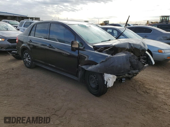 2009 Nissan Versa 1.8 S with VIN 3N1BC11E19L382395, listed as a Copart auction lot 41666375 with 153,899 mi miles and Salvage Title. Bid and sale history available at carsss.com. Image 4.