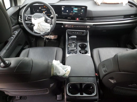 2025 Kia Carnival SX with VIN KNDNE5K34S6464842, listed as a Copart auction lot 49826435 with 11,365 mi miles and Salvage Title. Bid and sale history available at carsss.com. Image 8.