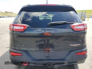 2014 Jeep Cherokee Trailhawk z VIN 1C4PJMBS1EW239692, wystawiony jako Copart lot #57153065 z przebiegiem 111 899 mil mil oraz Szkoda całkowita • Salvage title. Historia ofert i sprzedaży dostępna na DreamBid. Obrazek 6.