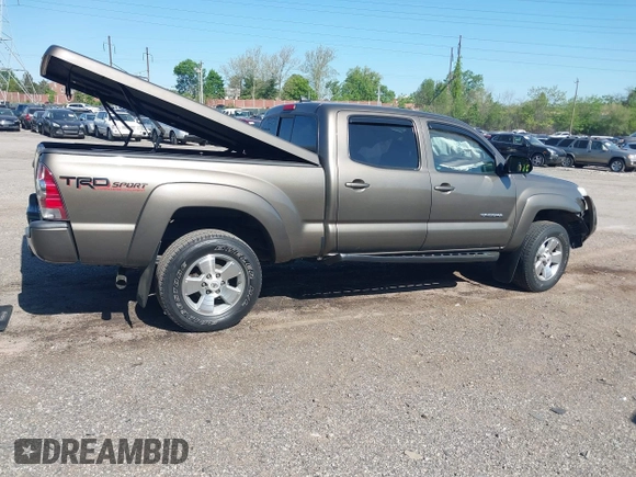 2015 Toyota Tacoma with VIN 3TMMU4FN5FM082376, listed as a IAAI auction lot 42144113 with 98,244 mi miles and . Bid and sale history available at DreamBid. Image 4.
