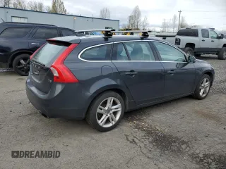 2015 Volvo V60 T5 Drive-E Premier z VIN YV140MEB2F1207148, wystawiony jako Copart lot #51272145 z przebiegiem 114 374 mil mil oraz Szkody całkowita. Historia ofert i sprzedaży dostępna na DreamBid. Obrazek 3.