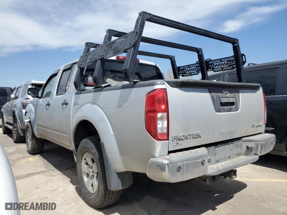 2013 Nissan Frontier SV with VIN 1N6AD0EV2DN745156, listed as a Copart auction lot 52398645 with 147,926 mi miles and Salvage Title. Bid and sale history available at carsss.com. Image 2.