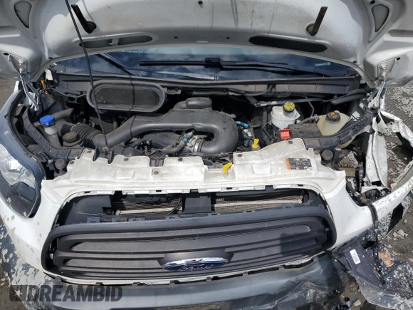2018 Ford Transit with VIN 1FTYE1CM2JKA74311, listed as a Copart auction lot 73213294 with 94,924 mi miles and Salvage Title. Bid and sale history available at DreamBid. Image 12.