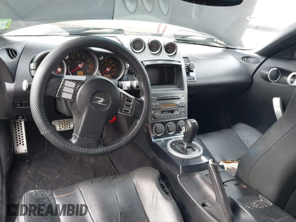 2003 Nissan 350Z Touring z VIN JN1AZ34E33T003711, wystawiony jako IAAI lot #41351191 z przebiegiem 167 503 mil mil oraz . Historia ofert i sprzedaży dostępna na DreamBid. Obrazek 8.