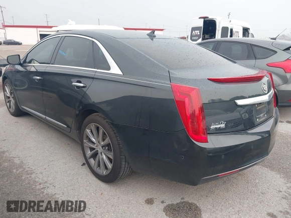 2014 Cadillac XTS z VIN 2G61L5S32E9326141, wystawiony jako IAAI lot #42300854 z przebiegiem 200 284 mil mil oraz . Historia ofert i sprzedaży dostępna na DreamBid. Obrazek 3.